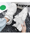 Sapatilha Masculina respirável para treinos ,  com sola grossa e confortável.